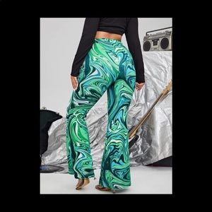 Shein plus size high waisted allover print flare legged pants